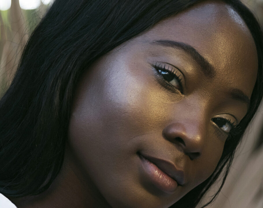 black woman's face with clear and glowing skin