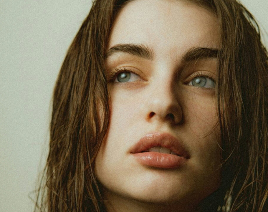 woman with damp hair and clear skin