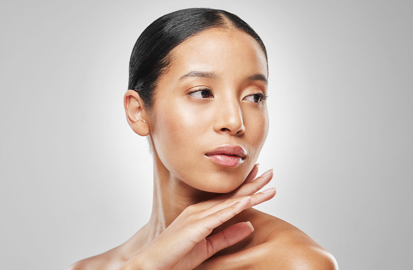 woman with hand on her chin