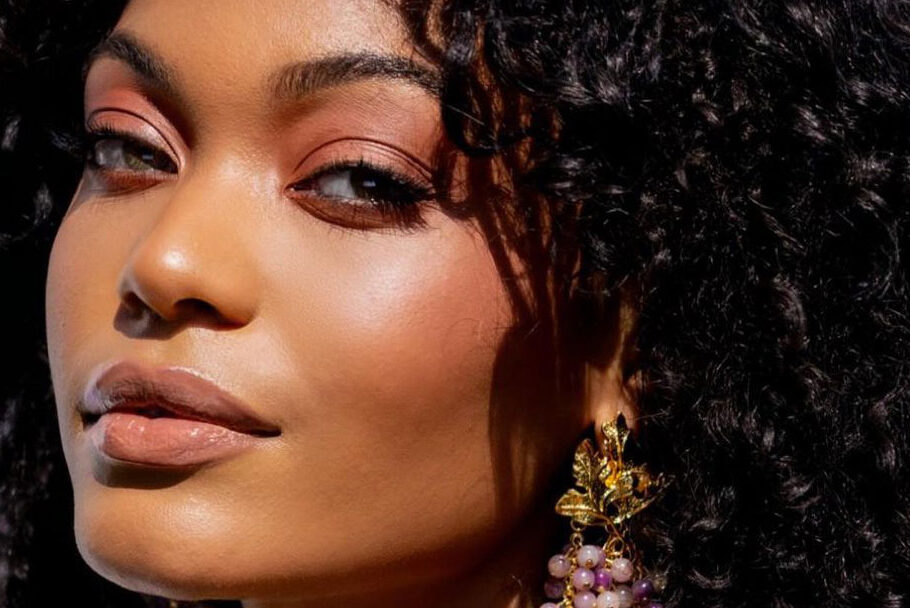 A close-up of model with full coverage makeup look