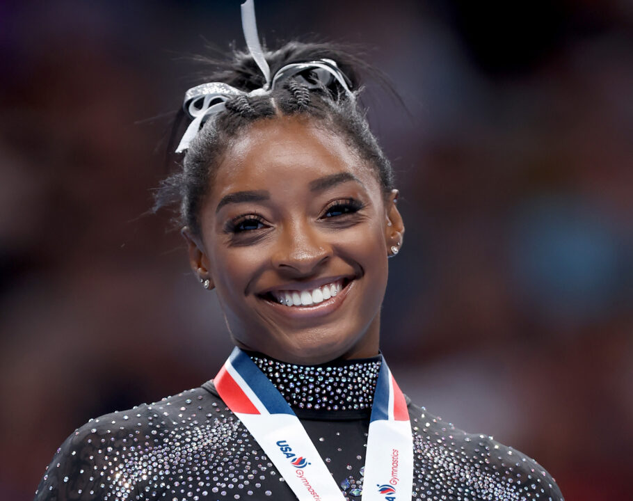 Simone Biles celebrates after placing first in the floor exercise competition on day four of the 2023 U.S. Gymnastics.